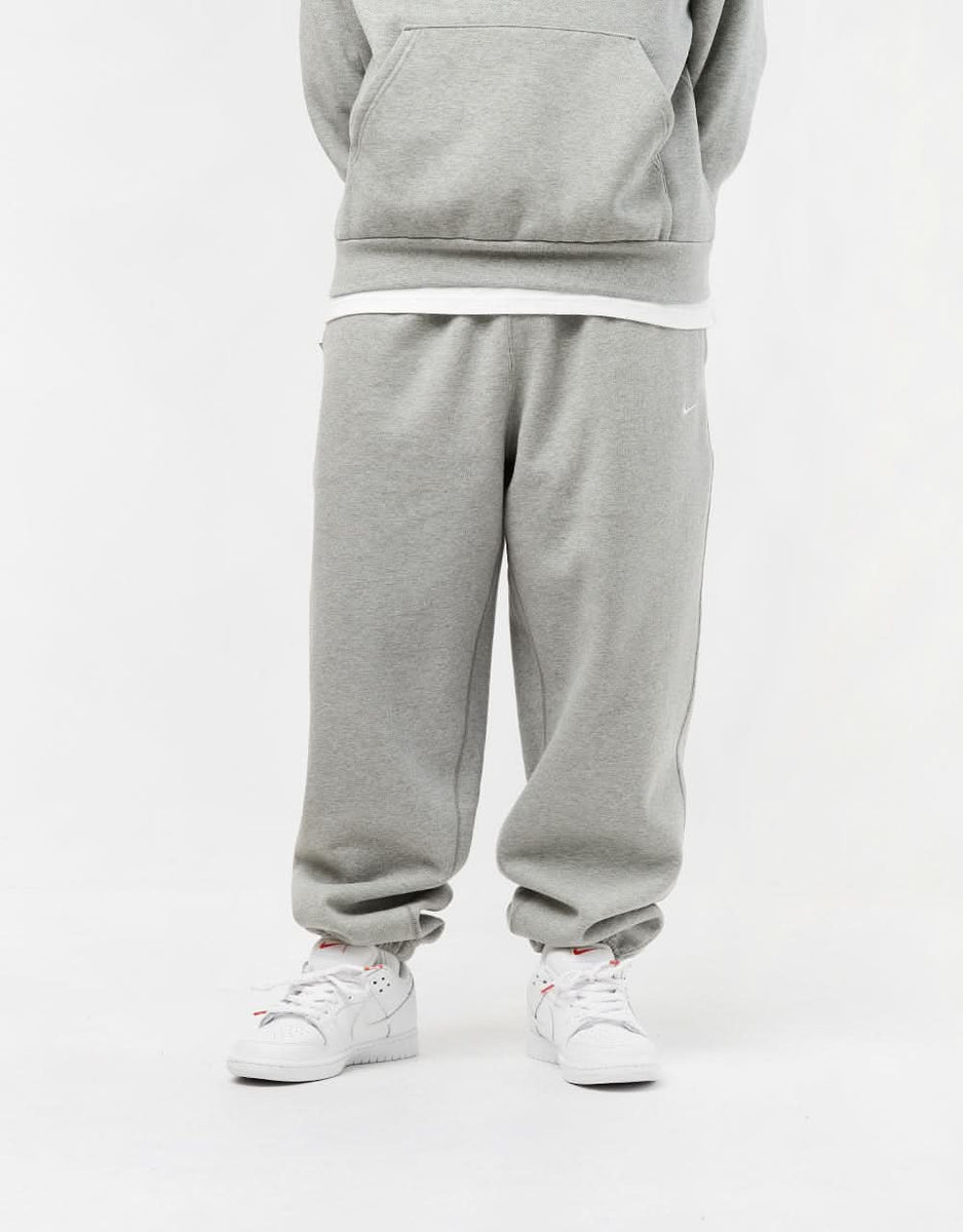 Nike Solo Swoosh Sweatpants Dark Grey Heather/White – Route One