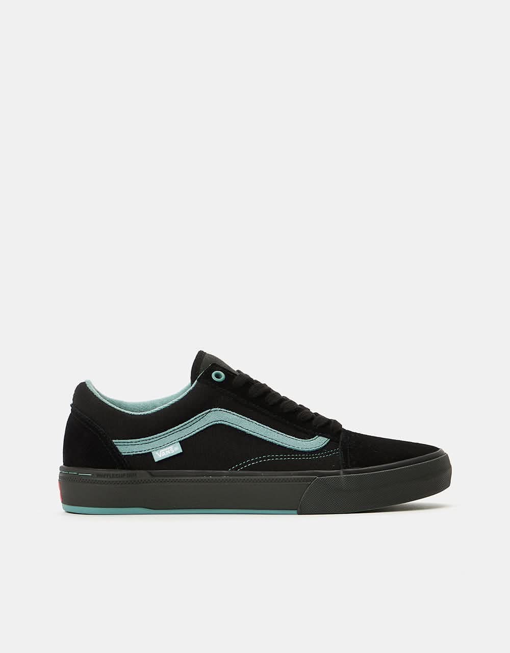 teal and pink vans