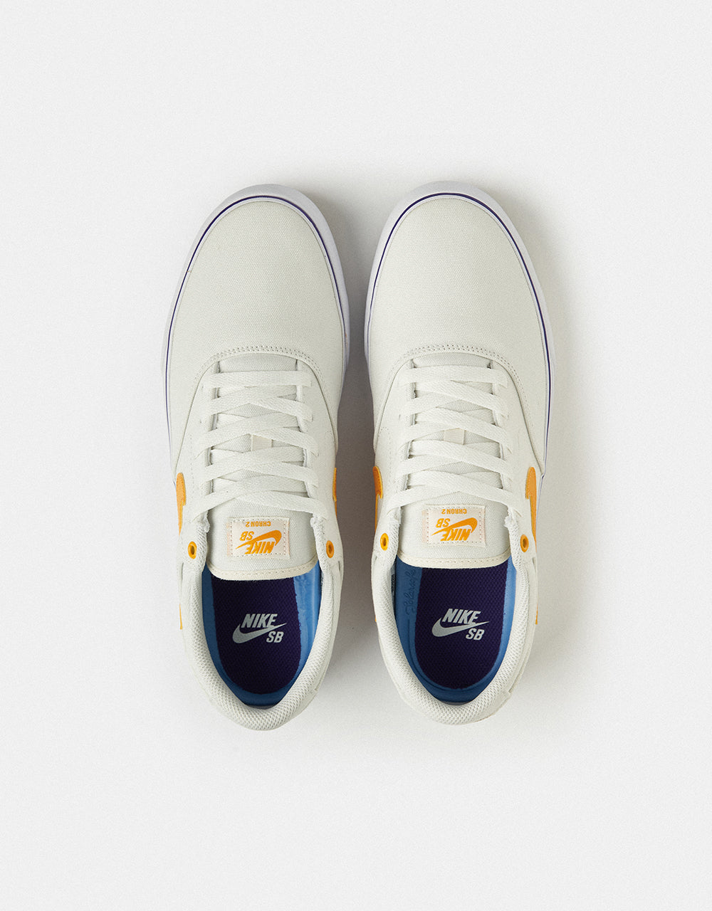 white blue and gold nike shoes
