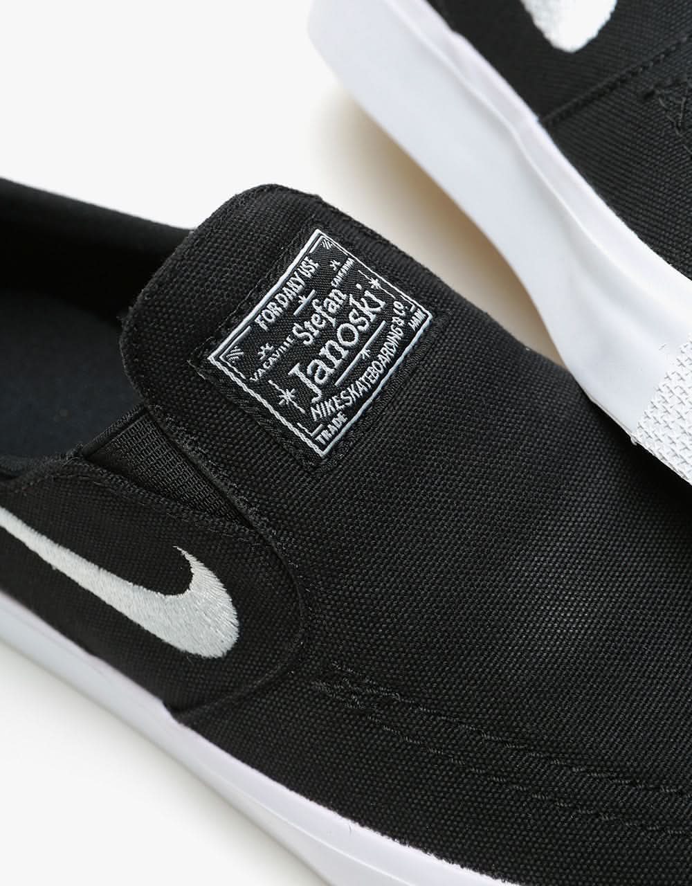 Nike sb janoski black  and  white canvas slip-on skate shoes Clearance