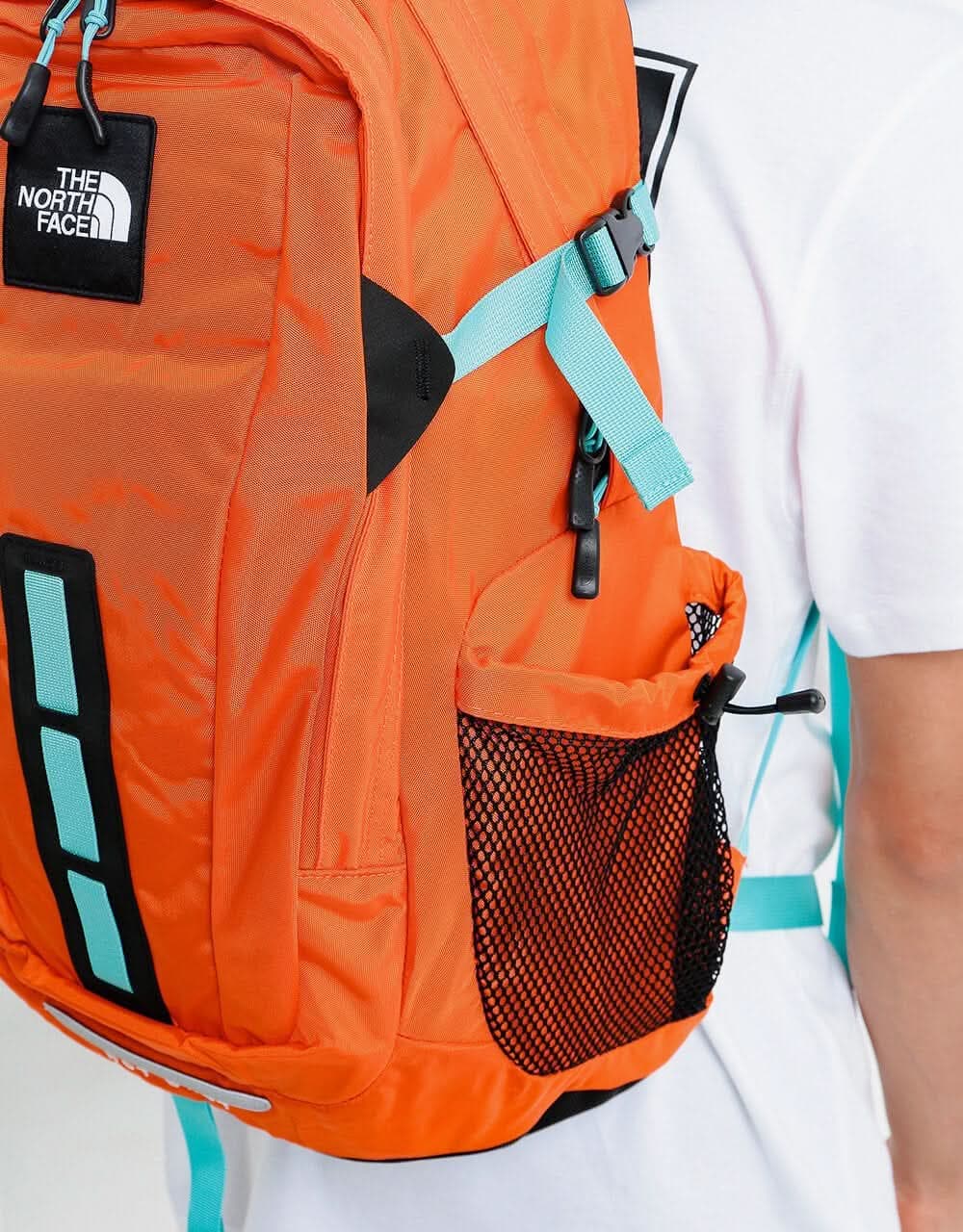 The North Face Hot Shot SE Backpack - Red Orange/Transantarctic Blue