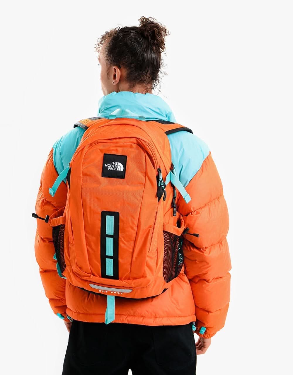 The North Face Hot Shot SE Backpack - Red Orange/Transantarctic Blue